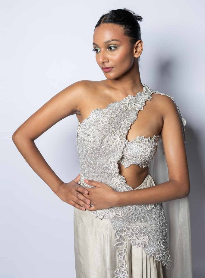 ONE SIDE PLEAT SKIRT WITH EMBELLISHED BUSTIER AND DRAPE