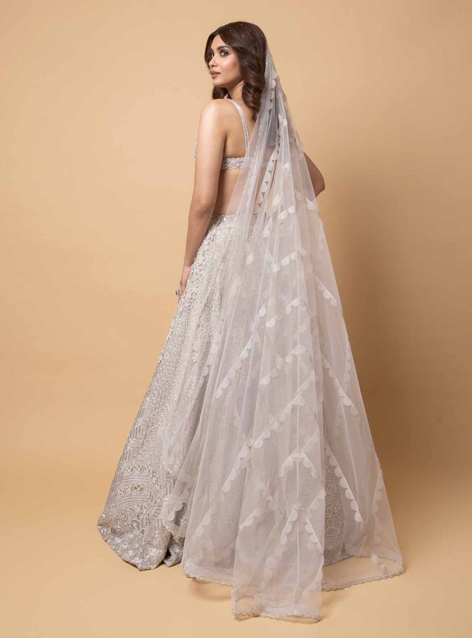 EMBELLISHED LEHENGA WITH BLOUSE AND TRAIL