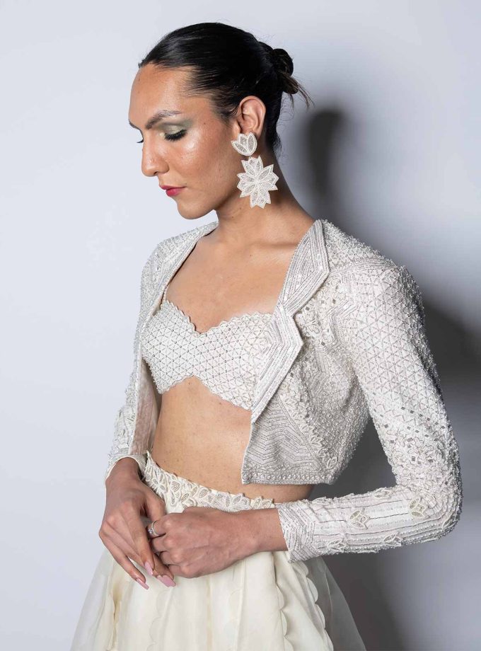 EMBELLISHED BUSTIER WITH SHORT JACKET AND ORGANZA SKIRT WITH TEXTURED ORGANZA DRAPE